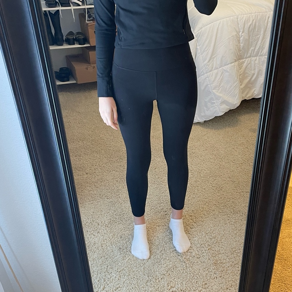 Athleta ultra high rise salutation stash 7/8 black size medium